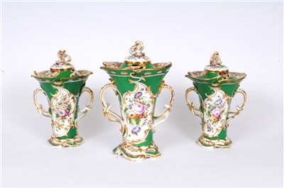 Lot 10 - A garniture of Coalbrookdale-style porcelain vases