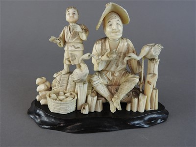 Lot 121 - A Japanese carved sectional ivory cormorant...