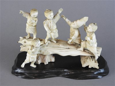 Lot 78 - A Japanese carved sectional ivory group of...