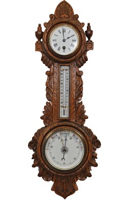 Lot 166 - An early 20th century oak cased wall-hanging barometer