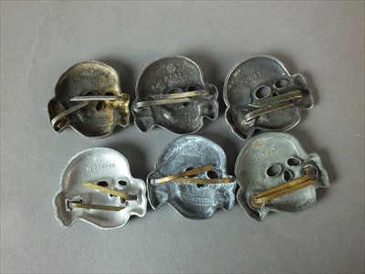 Lot 336 - Reproduction German SS visor cap skulls and eagles