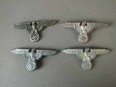 Lot 336 - Reproduction German SS visor cap skulls and eagles