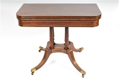 Lot 748 - A Regency brass strung rosewood veneered card table
