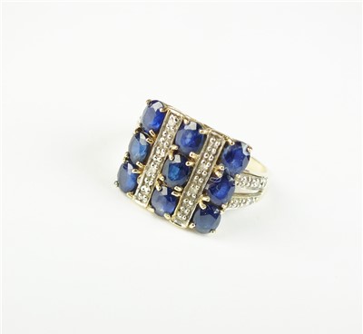 Lot 92 - A sapphire and diamond dress ring