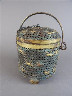 Lot 516 - A Chinese parcel gilt metal basket and cover...