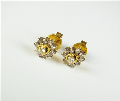 Lot 70 - A pair of diamond cluster earrings