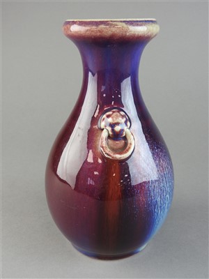 Lot 10 - A Chinese flambe pear shaped vase, Qing...