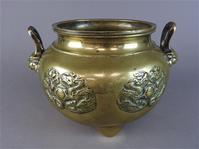 Lot 525 - A Chinese brass two handled censer, late Qing...