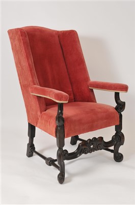 Lot 464 - A 19th century upholstered Carolean style wing back armchair