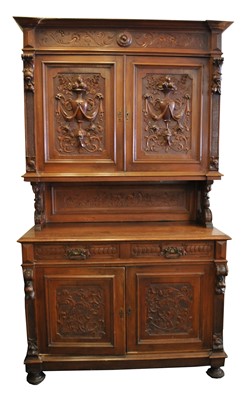 Lot 620 - A large 19th century carved French walnut cabinet