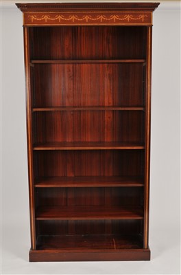 Lot 473 - A pair of tall free-standing mahogany bookcases in the Edwardian style