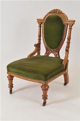 Lot 523 - A Victorian walnut framed upholstered nursing chair