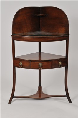 Lot 506 - A 19th century mahogany corner wash stand