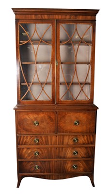 Lot 450 - An early 20th century mahogany veneered secretaire bookcase