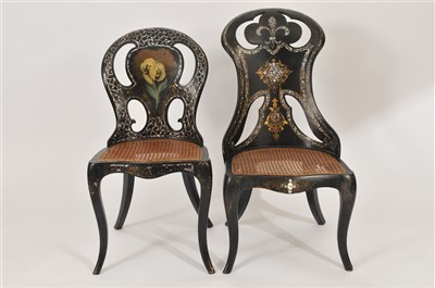 Lot 417 - Two similar 19th century black lacquered cane-seated bedroom chairs