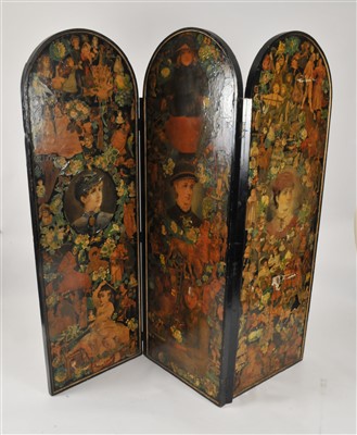 Lot 527 - A decorative Edwardian three fold decoupage dressing screen