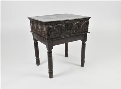 Lot 609 - A 17th century and later country carved oak bible box on stand