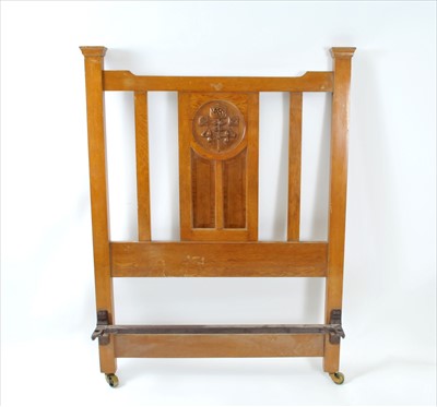 Lot 782 - A pair of Art Nouveau carved pale oak single beds