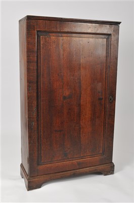 Lot 452 - A rustic 18th century and later country oak hall cupboard