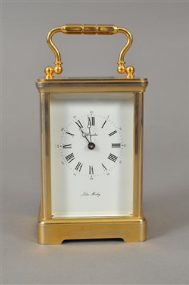 Lot 408 - A good quality brass carriage clock by John Morley