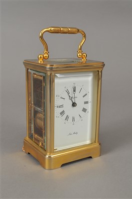 Lot 408 - A good quality brass carriage clock by John Morley