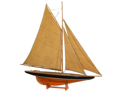 Lot 370 - A large painted wooden model sail boat