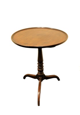 Lot 512 - A 19th century mahogany tilt-top tripod table