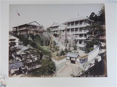 Lot 101 - A Japanese lacquer bound photograph album of...