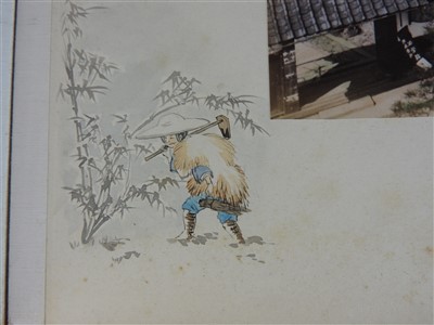 Lot 101 - A Japanese lacquer bound photograph album of...