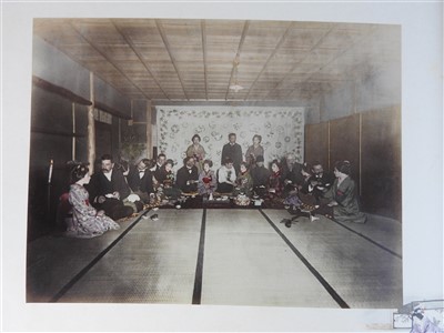 Lot 101 - A Japanese lacquer bound photograph album of...