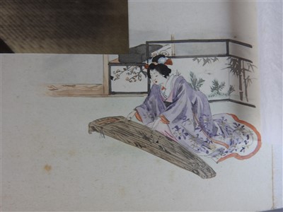 Lot 101 - A Japanese lacquer bound photograph album of...
