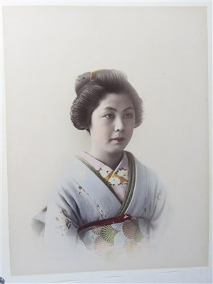 Lot 101 - A Japanese lacquer bound photograph album of...
