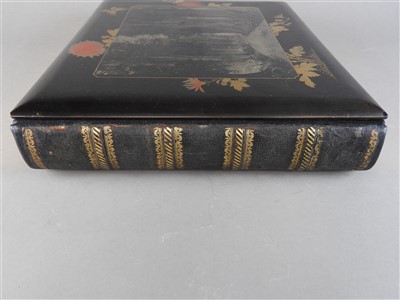 Lot 101 - A Japanese lacquer bound photograph album of...
