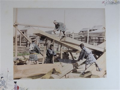 Lot 101 - A Japanese lacquer bound photograph album of...