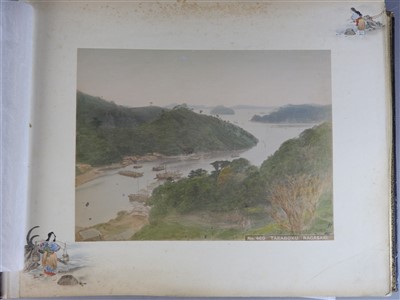 Lot 101 - A Japanese lacquer bound photograph album of...