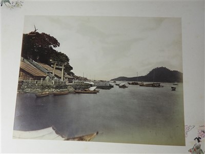 Lot 101 - A Japanese lacquer bound photograph album of...