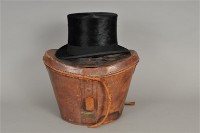 Lot 446 - A leather boxed Lincoln Bennett & Company top hat