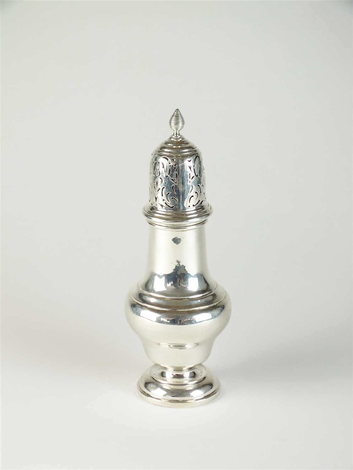 Lot 130 - A silver sugar caster