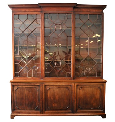 Lot 536 - A very large 19th century mahogany three-sectional astragal glazed break-front bookcase