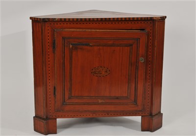 Lot 492 - A 19th century walnut veneered corner cupboard