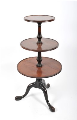 Lot 751 - A 19th century mahogany three tier tripod dumb waiter