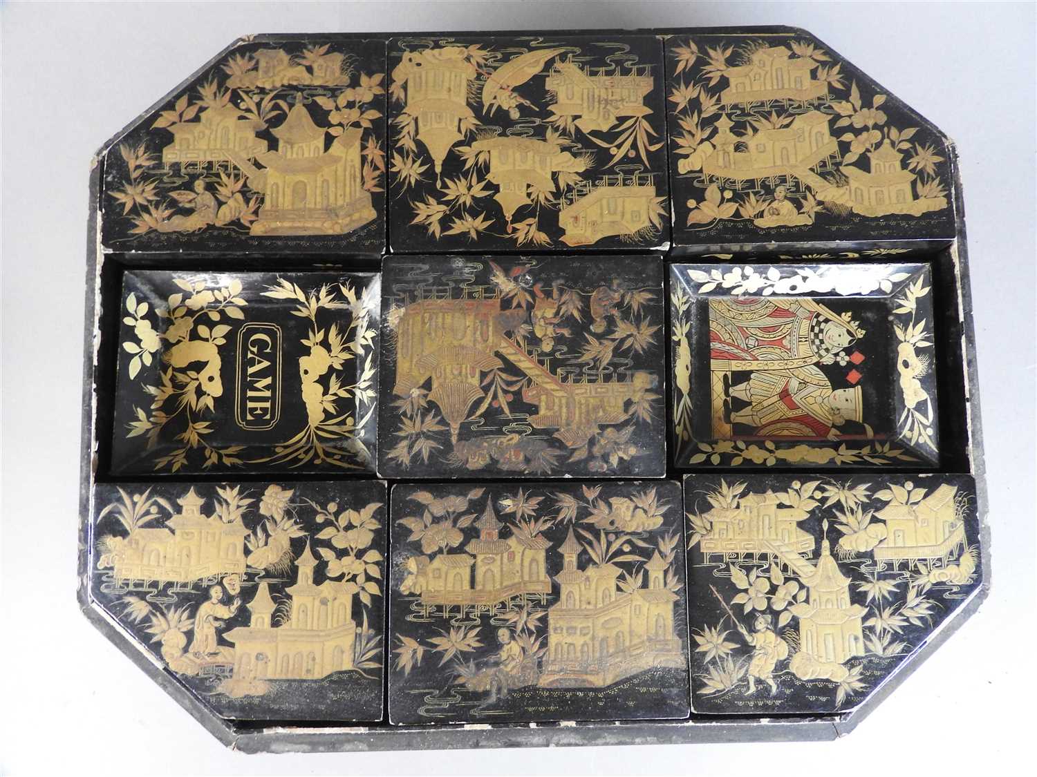 Lot 118 - A Chinese export lacquer games box and cover,...