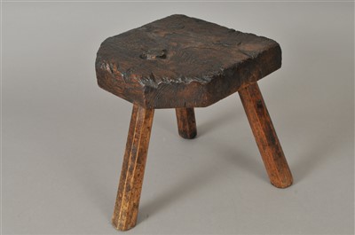 Lot 286 - A 19th century or earlier rustic tripod milking stool