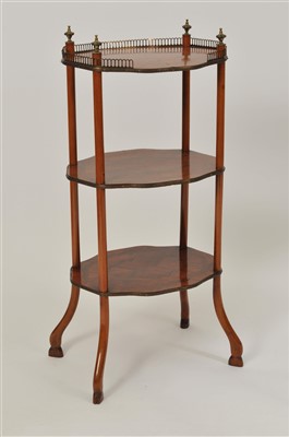Lot 495 - An early 20th century French three tier Kingwood etagere