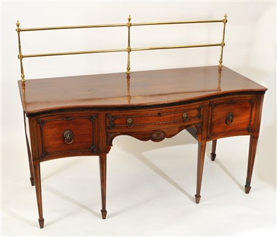 Lot 377 - A 19th century mahogany serpentine sideboard