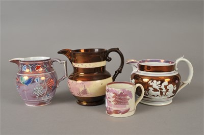 Lot 194 - Four 19th century pink and copper lustre jugs