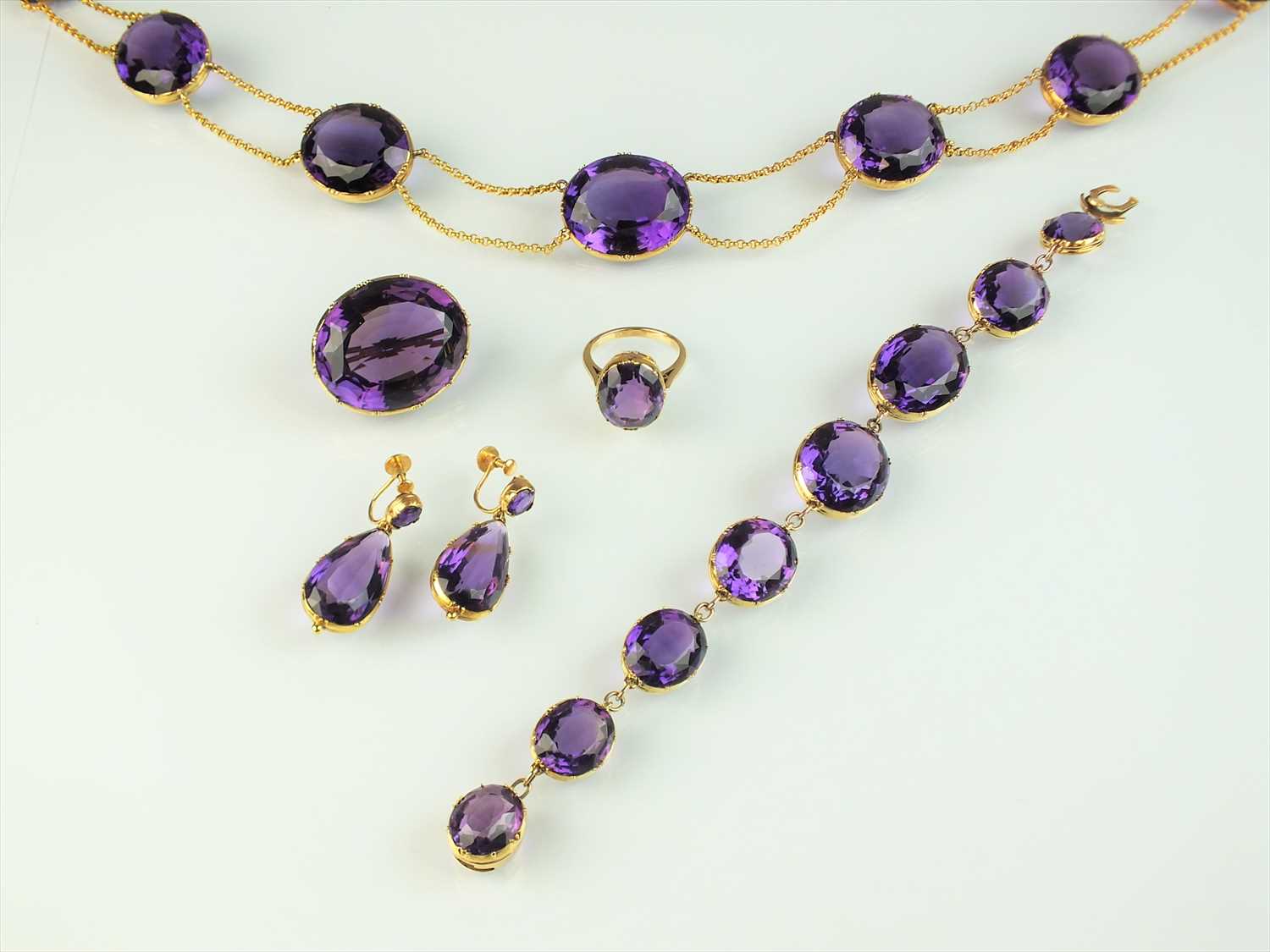 Lot 57 - A late 19th century suite of amethyst jewellery