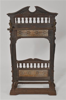 Lot 423 - A small Coalbrookdale cast iron framed stick stand