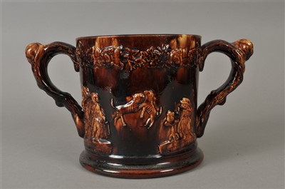 Lot 208 - Staffordshire twin-handled frog mug