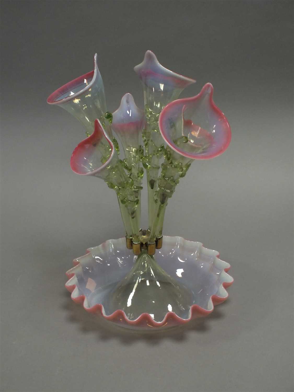 Lot 209 - A late Victorian cranberry and uranium glass epergne